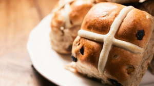 You know the nursery rhyme, "Hot cross buns! Hot cross buns! One a penny, two a penny, Hot cross buns!", but do you know why we eat these golden brown buns specifically on Good Friday? It all has to do with the end of Lent and the symbols...