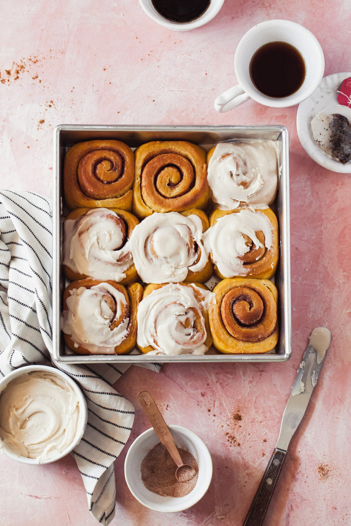 Do you literally dream of warm, gooey cinnamon rolls at night?  With this recipe you can make these dreams come true and eat fresh-out-of-the-oven Overnight Pumpkin Cinnamon Rolls in your pajamas without having to wake at dawn!