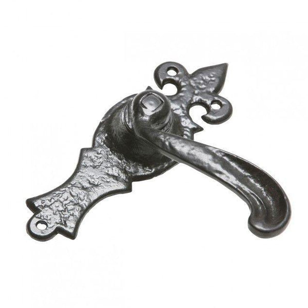 Curved Lever Iron Door Handle On Hour Glass Fleur De Lys Backplate · Kirkpatrick 2442 ·